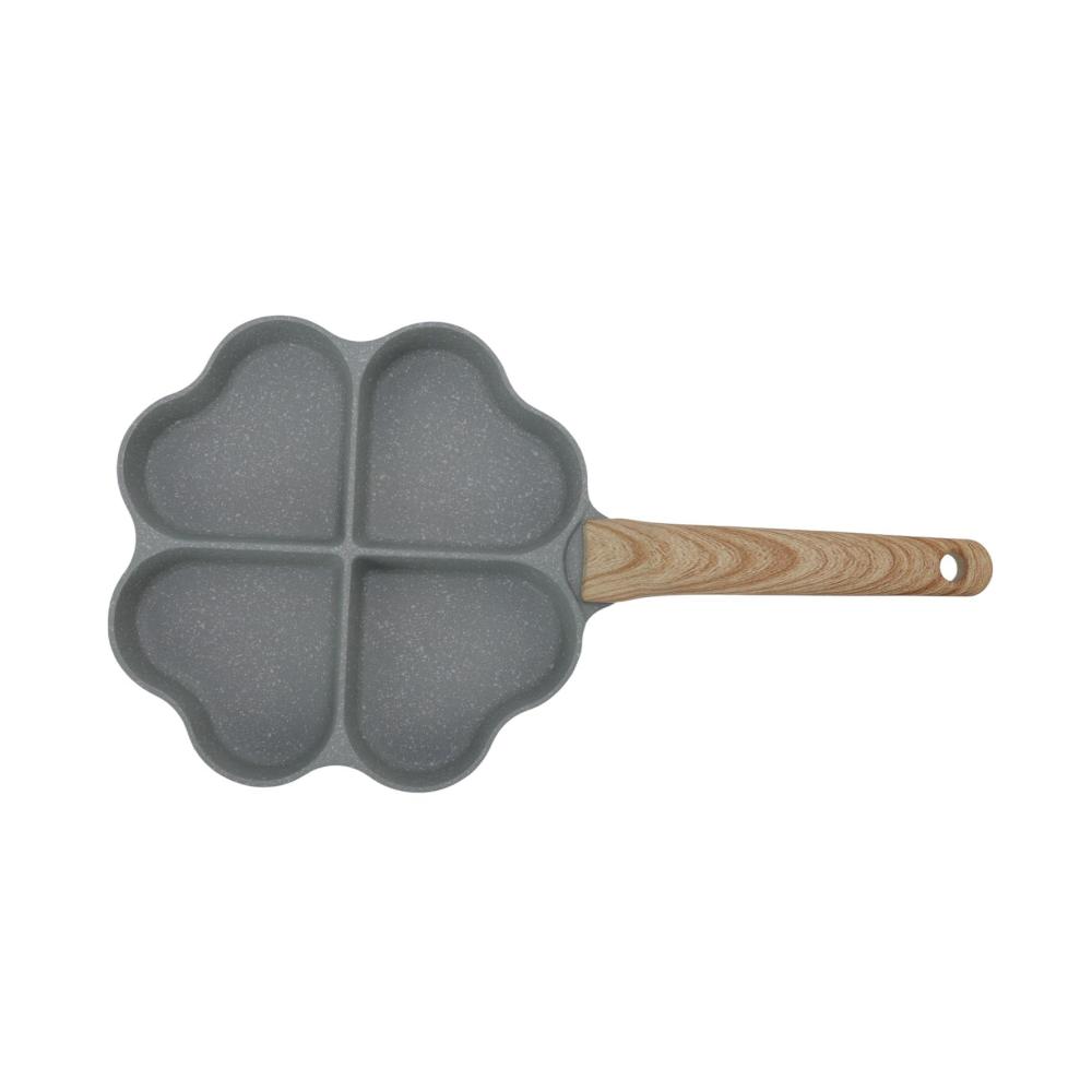 Entdecken Sie die Magie des Kochens mit unserer Eggcelente Pfanne! 4-Tassen Kapazität Antihaftbeschichtung herzförmiges Design für perfekte Omeletts. Gleichmäßige Heizung für köstliche Pfannkuchen. Stilvoller Griff in Grün. Ihre perfekte Küchenlösung