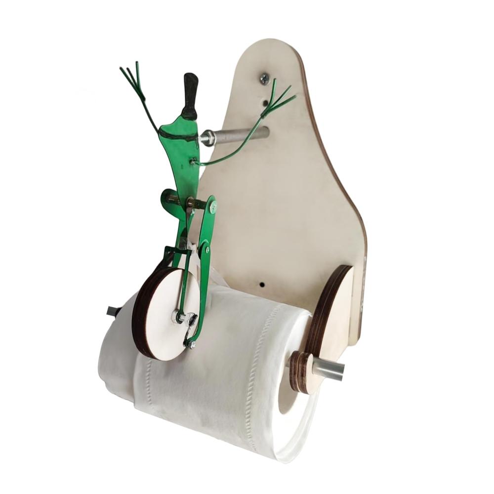Entzückender Frosch-Rollenhalter aus Holz Einzigartige WC-Papierhalterung für eine lustige Badezimmergestaltung. Frosch auf Einrad und Fahrrad. Fröhliche Akzente