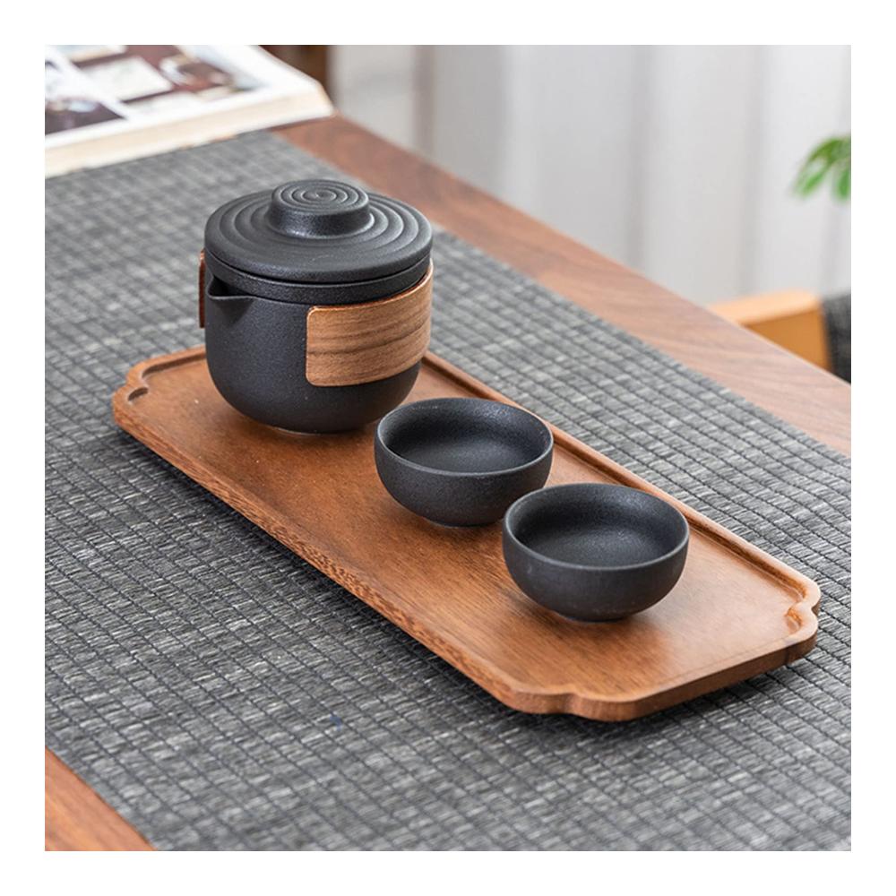 Entdecken Sie unterwegs den Genuss Tragbares Anti-Brenn-Mini-Teeservice aus Keramik - Perfekt für Outdoor-Teegenuss! Inklusive Tee-Ei-Set und Aufbewahrungstasche. Ideales Reise-Teeset mit Schwarzem Topf und 4 Tassen für unterwegs