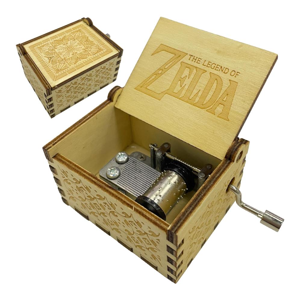 Entdecken Sie den Zauber von Zelda mit unserer handgeschnitzten Holz-Spieluhr. Genießen Sie die einzigartige Zelda-Melodie mit dieser dekorativen Musikbox für Erwachsene. Handkurbeln Sie die hölzernen Musikboxen für einen nostalgischen Klang. Authentisch graviert mit antikem Charme ist diese Zelda-Spieluhr ein beeindruckendes Kunstwerk für Musikliebhaber. Verleihen Sie Ihrem Raum einen Hauch von Eleganz mit dieser englisch bedruckten Holz-Musikbox. Ein Must-have für alle Zelda-Fans und Liebhaber handgefertigter Musikinstrumente