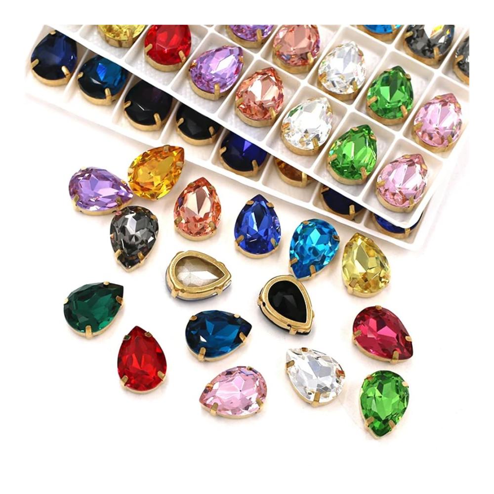 Entdecken Sie den Glanz Strasssteine in Tropfenform goldfarben perfekt für Kleidung Schuhe und Taschen! Krallenfassung für sicheren Halt 18 x 25 mm 12 Stück Set. Verleihen Sie Ihren Kreationen einen Hauch von Luxus