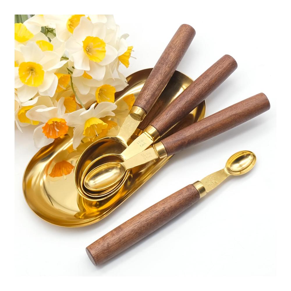 Entdecken Sie unsere hochwertigen 4-teiligen Messlöffelsets mit eleganten Holzgriffen für präzises Backen und Kochen - Ein Must-Have für Ihre Küche