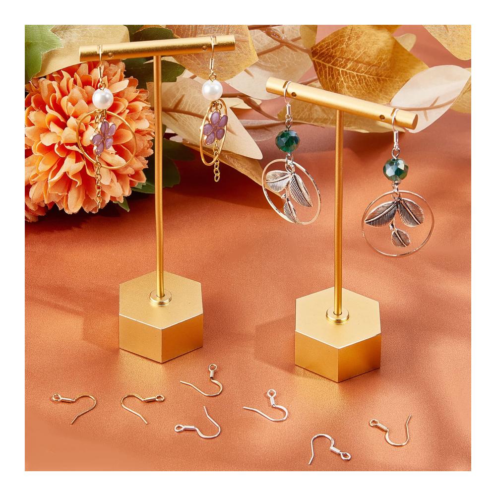 Entdecken Sie den Glanz 100 Ohrhaken in 2 Farben - Edle Angelhaken in 24K Gold & Sterling Silber Vergoldung. Brillante Messing-Ohrhaken für DIY-Ohrringe. Inklusive Ohrringherstellungsset und transparenter Aufbewahrungsbox. Perfekt für einzigartigen Ohrsch