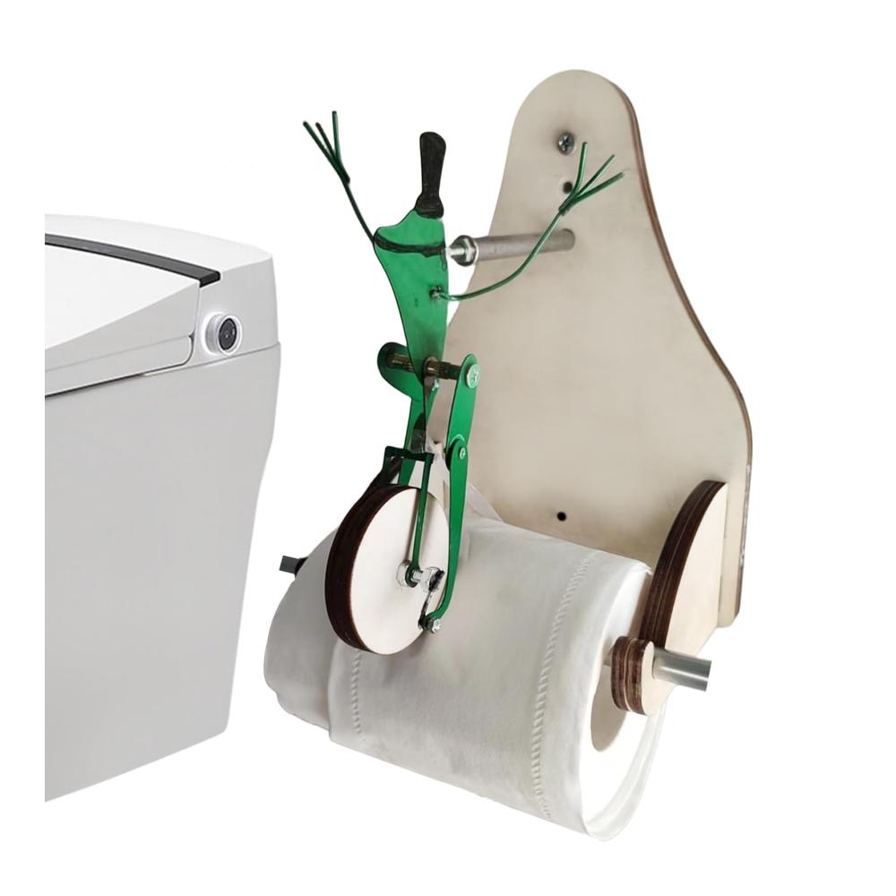 Entzückender Frosch-Rollenhalter aus Holz Einzigartige WC-Papierhalterung für eine lustige Badezimmergestaltung. Frosch auf Einrad und Fahrrad. Fröhliche Akzente