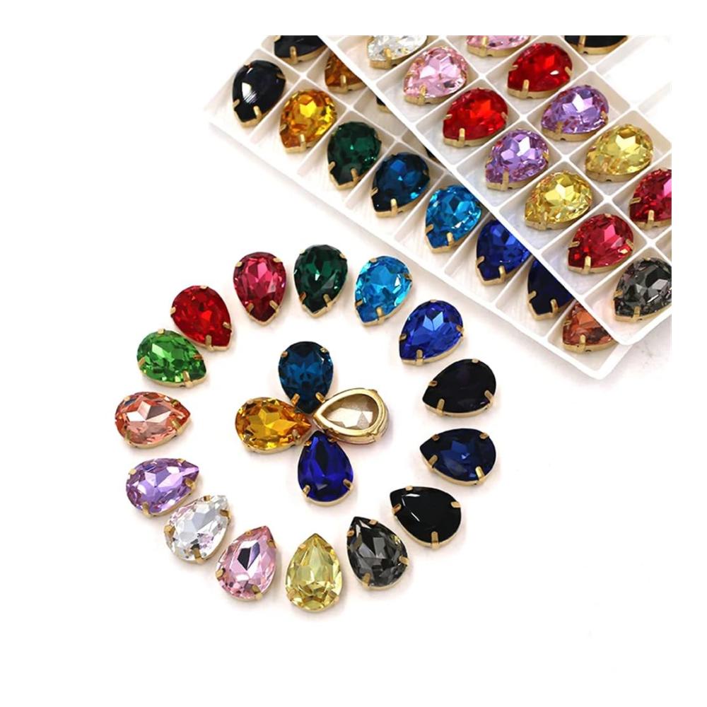 Entdecken Sie den Glanz Strasssteine in Tropfenform goldfarben perfekt für Kleidung Schuhe und Taschen! Krallenfassung für sicheren Halt 18 x 25 mm 12 Stück Set. Verleihen Sie Ihren Kreationen einen Hauch von Luxus