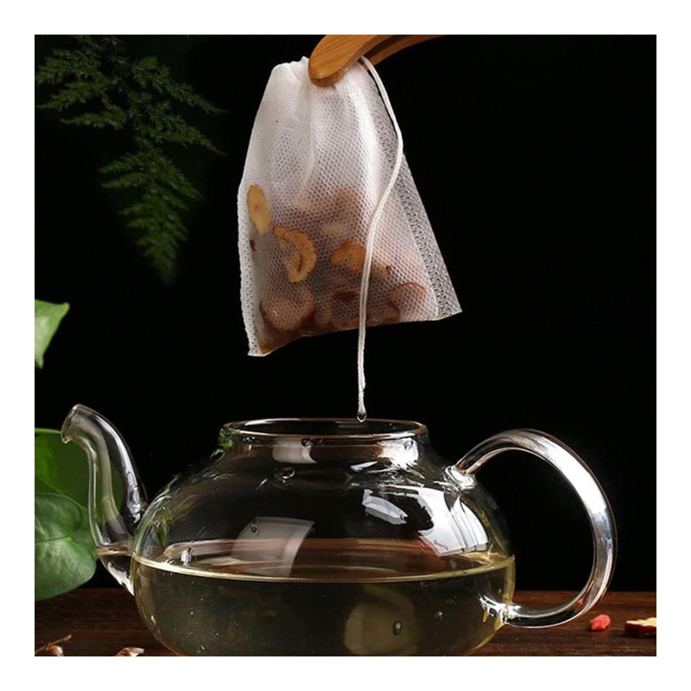 Entdecken Sie den Genuss des Teebrauens mit unseren Teefiltern - 200 Stück Papier-Teebeutel zum Selbstbefüllen mit Musselin-Kordelzug. Wiederverwendbare Teebeutel mit sicherem Kordelzug-Siegel ideal für Kaffee Lavendel Teeblumen und Kochkunst. Erleben Sie perfekten Geschmack mit unseren Tee Filter Taschen