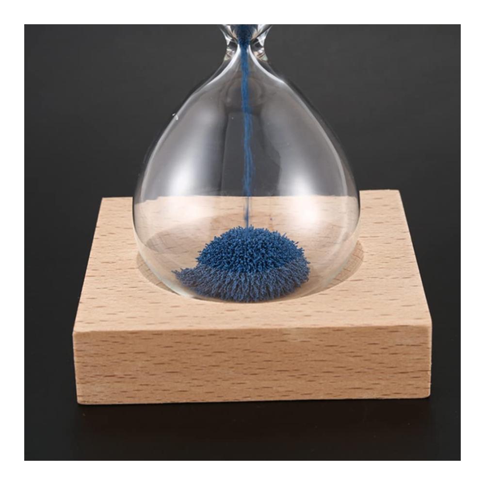 Moderne Wanduhr Magnetische Sanduhr aus Glas & Eisenpulver mit blühendem Design - Inklusive Holzständer & Geschenkverpackung
