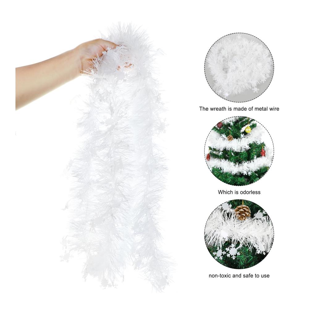 Entdecken Sie den Zauber der Festtage mit unserer exquisiten 6 x 2M Weihnachtsgirlande! Weiß mit Schneeflocken und Tannengirlanden verschönert sie jeden Raum. Verleihen Sie Ihrem Weihnachtsbaum Glanz mit Lametta während die Winter Girlande Wand Tür Fenster Kamine und Treppengeländer schmückt. Bringen Sie festliche Freude in Ihr Zuhause