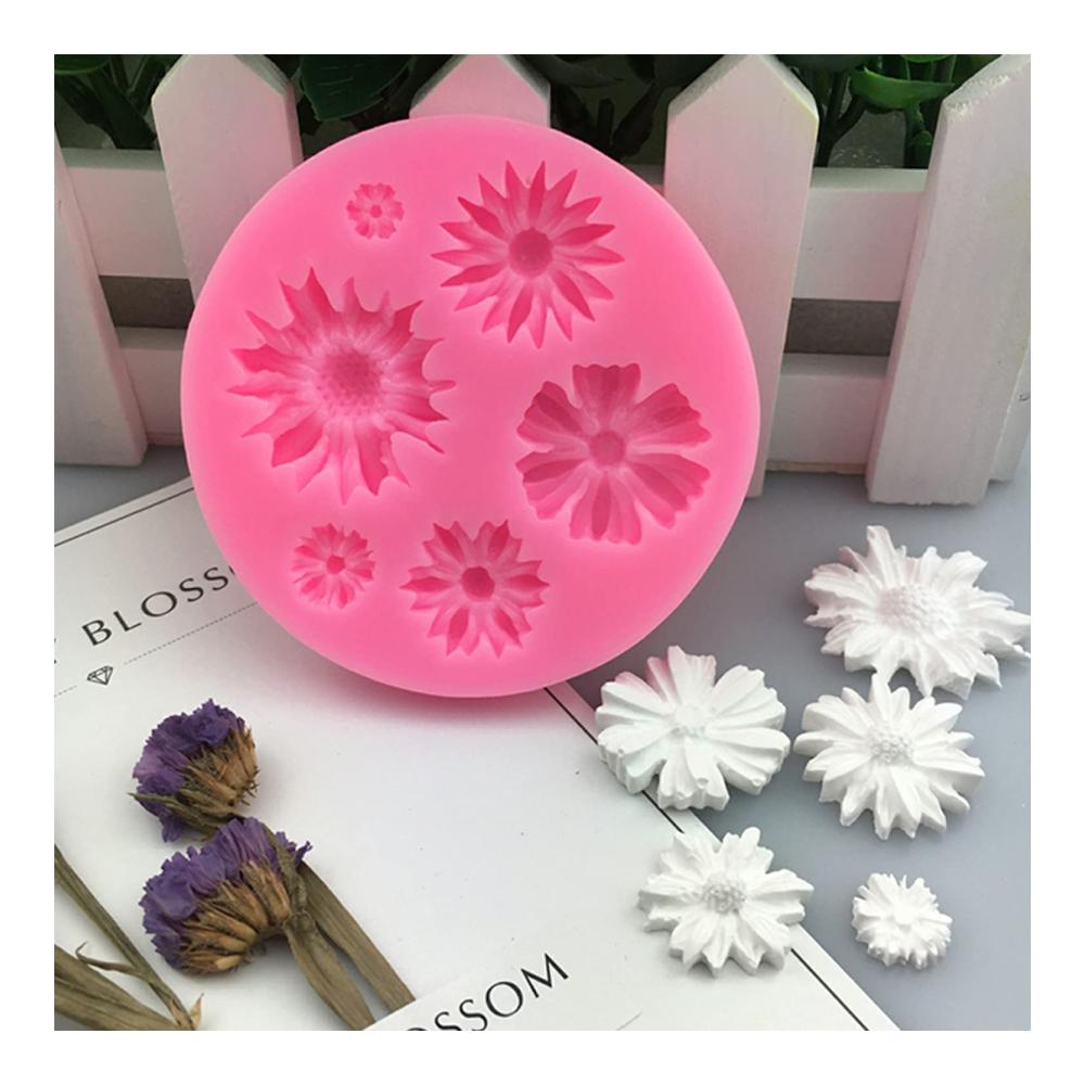 Premium Schokoladenformen Set - 7 Stück Silikonformen für Süßigkeiten Fondant & mehr | Rosen Gänseblümchen Blumen Schmetterling Blätter Libelle Bow | Inklusive 2 Tropfer für perfekte Dekoration