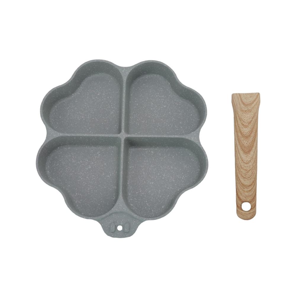Entdecken Sie die Magie des Kochens mit unserer Eggcelente Pfanne! 4-Tassen Kapazität Antihaftbeschichtung herzförmiges Design für perfekte Omeletts. Gleichmäßige Heizung für köstliche Pfannkuchen. Stilvoller Griff in Grün. Ihre perfekte Küchenlösung
